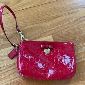 Barely used red Coach wristlet